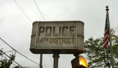 woman robbed at gunpoint while waiting for the bus, police say